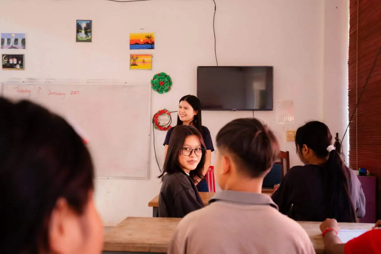 Teacher Explaining a Lesson to Students