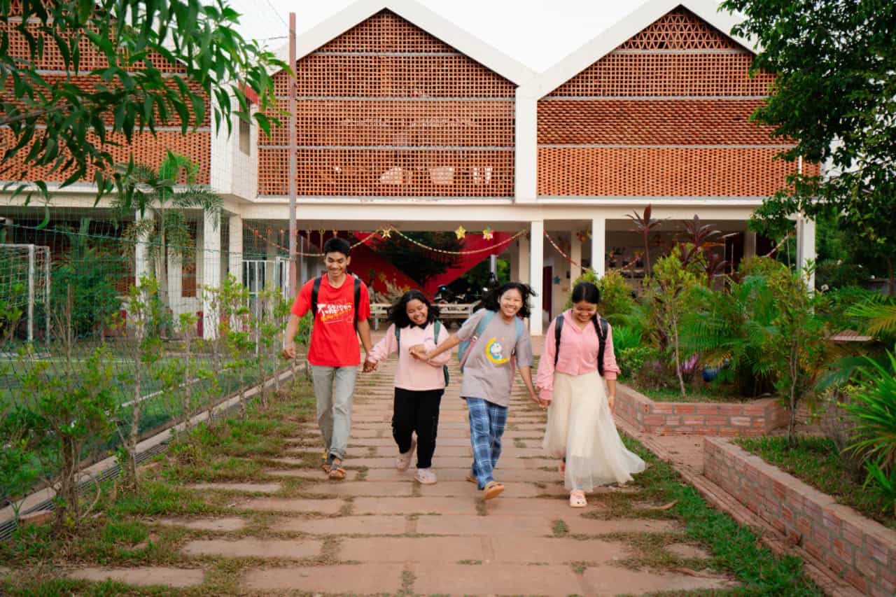 Students Walking Together on a Garden